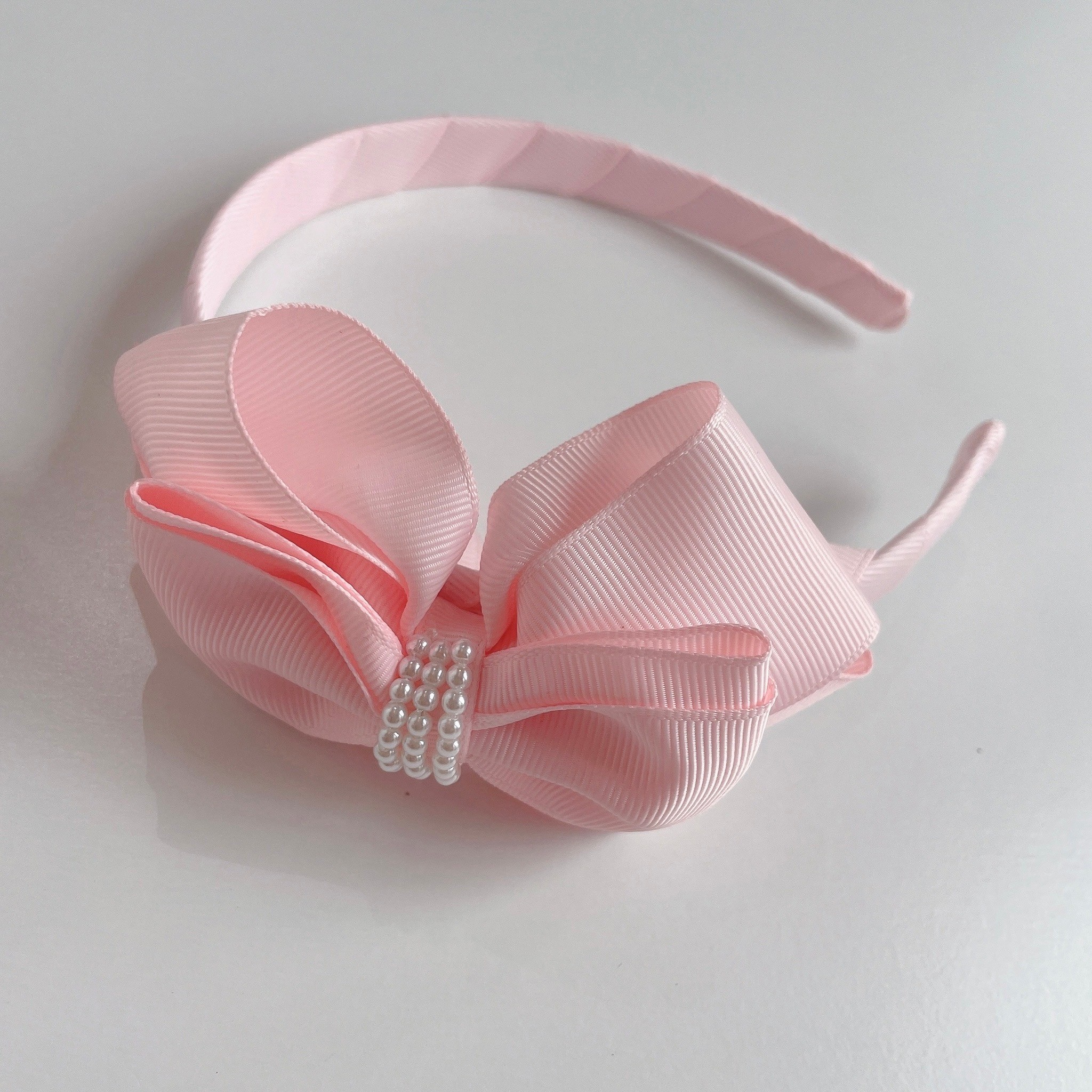 パールリボンピンクカチューシャ